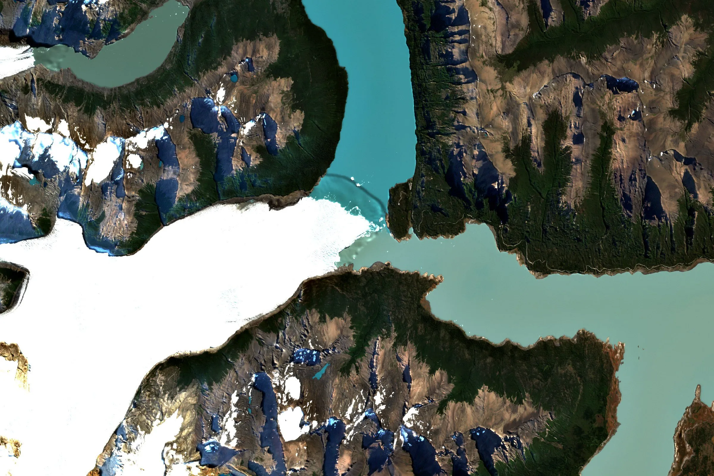 Satellite view of the Perito Moreno glacier in Patagonia meeting a turquoise lake